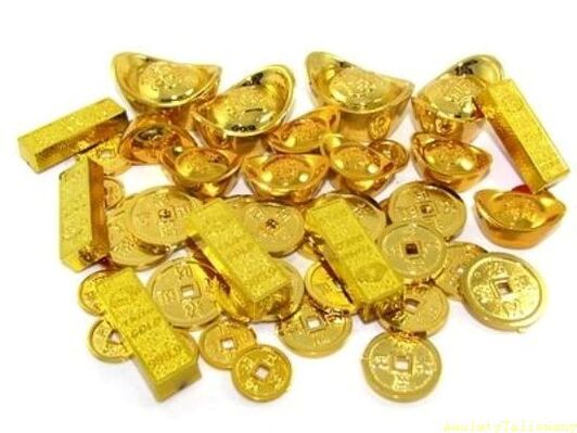 gold bars and coins as amulets of fortune